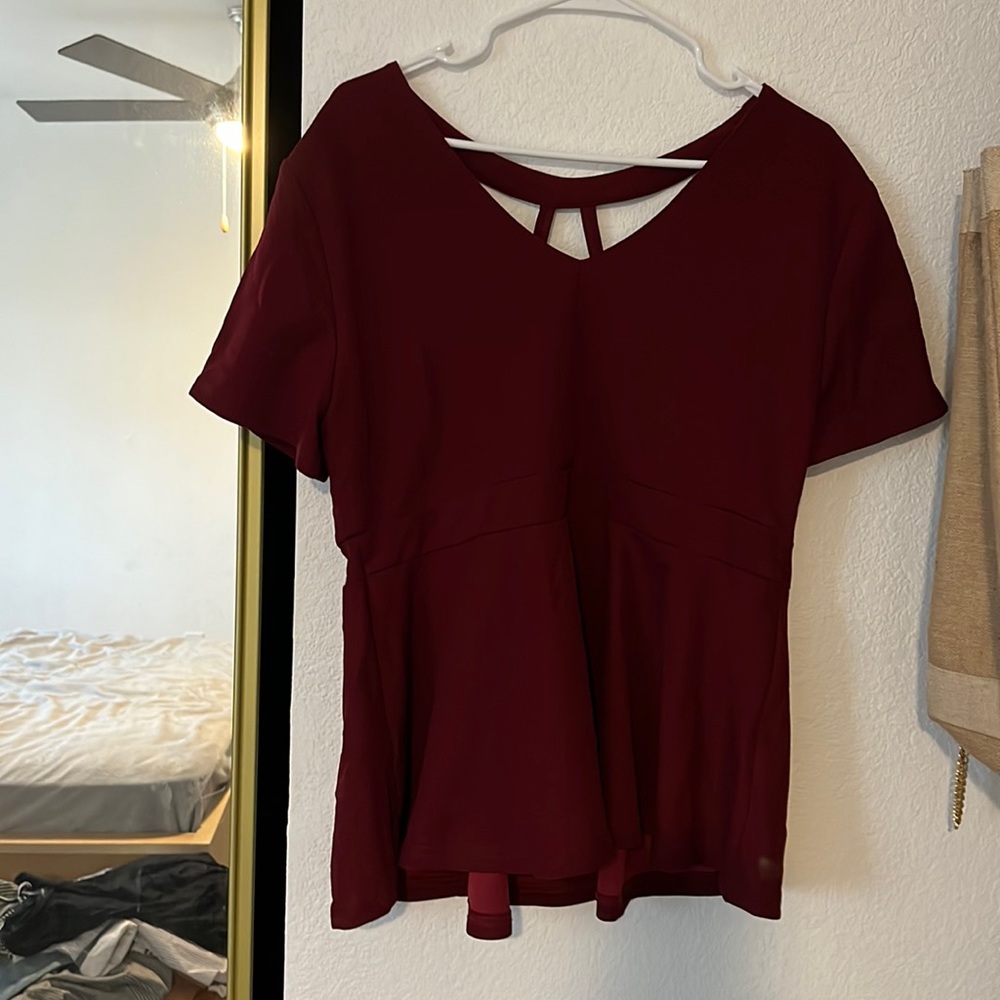 Peplum top red stretchy open detail on back